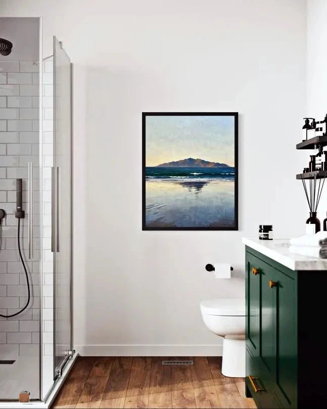Quiet Horizon Seascape Wall Art hanging in a modern bathroom with green vanity and wood flooring. A Calm Ocean Horizon That Brings Stillness to a Space Wall Art.