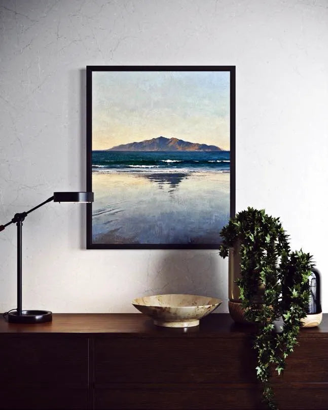 Quiet Horizon Seascape Wall Art above a dark wood console with greenery and a ceramic bowl. A Calm Ocean Horizon That Brings Stillness to a Space Wall Art.