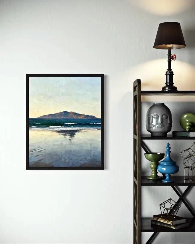 Quiet Horizon Seascape Wall Art on a white wall beside a shelf with modern decor and a black lamp. A Calm Ocean Horizon That Brings Stillness to a Space Wall Art.